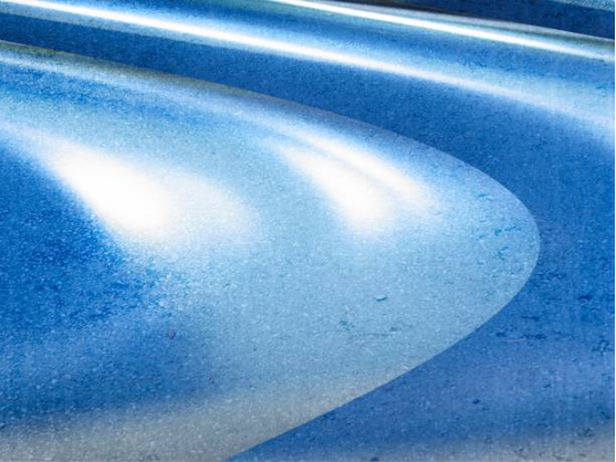 Garage Floor Coating Light Enhancement 2 Close-up of smooth, reflective garage floor surface.