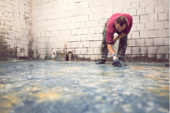 Close-up of a garage floor coating with bubbling effects