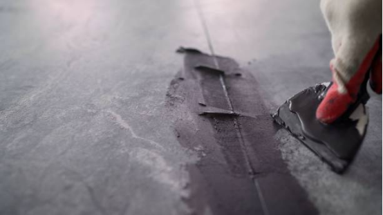 Example of garage floor with visible peeling and damage