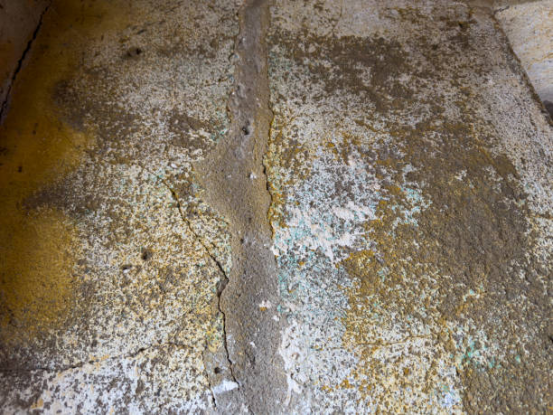 Surface powdering before Garage Floor Coating application