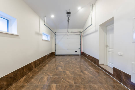 ulti-use home garage with garage floor coating and clear functional zones