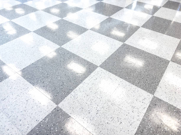 Reflective checkerboard pattern on a stylish garage floor coating.